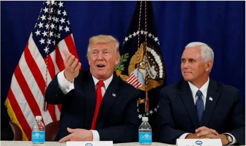 Tổng thống Mỹ Donald Trump (trái) và Phó Tổng thống Mỹ Mike Pence họp báo sau một cuộc họp an ninh tại New Jersey ngày 10-8. Ảnh: REUTERS