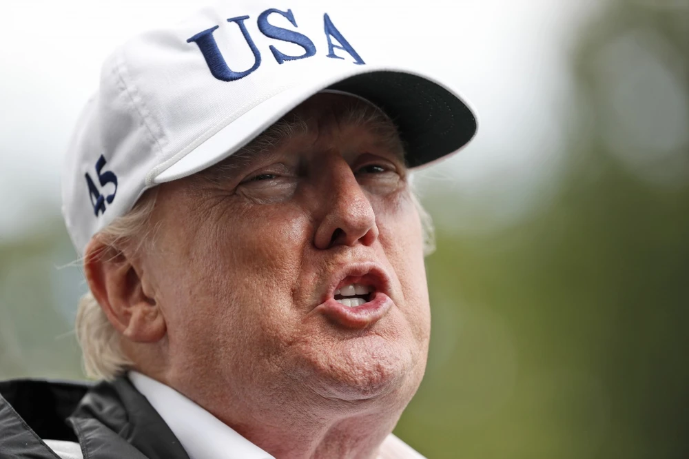 Tổng thống Mỹ Trump trả lời truyền thông tại Nhà Trắng ngày 14-9. Ảnh: AP