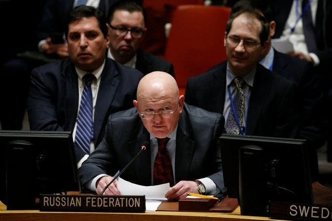 Đại sứ Nga tại LHQ Vassily Nebenzya trong phiên họp của HĐBA LHQ về Syria ngày 22-2. Ảnh: REUTERS