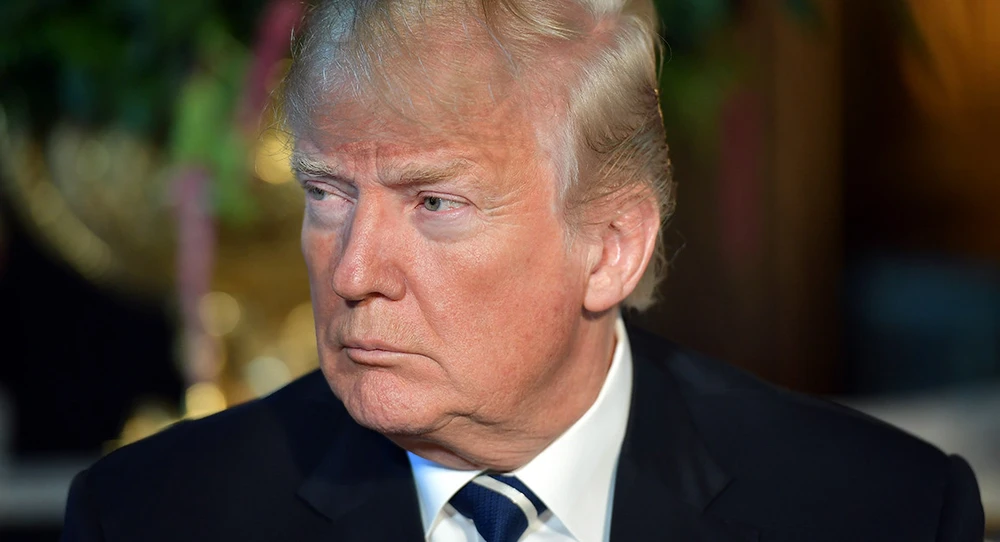 Tổng thống Mỹ Donald Trump quyết định bỏ kế hoạch trừng phạt Nga vì Syria. Ảnh: AP