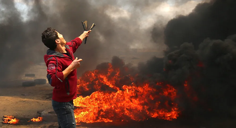 58 người Palestine chết, hơn 2.700 người bị thương trong cuộc biểu tình phản đối Israel và Mỹ tại biên giới Dải Gaza-Israel ngày 14-5. Ảnh: AFP