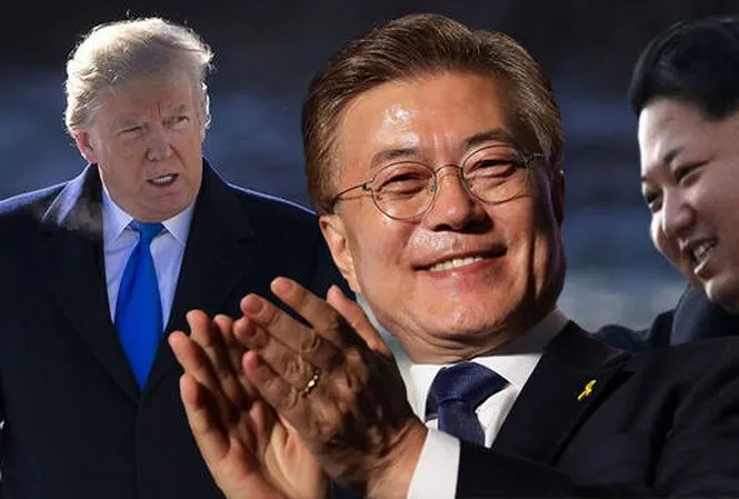Ông Moon (giữa) có thể bay sang Singapore dự thượng đỉnh ba bên với ông Trump và ông Kim, bàn chấm dứt chiến tranh Triều Tiên, thống nhất liên Triều. Ảnh: DAILY EXPRESS