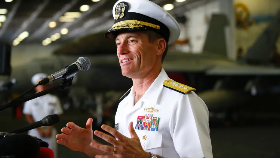 Chuẩn Đô đốc Marc Dalton - Chỉ huy tàu USS Ronald Reagan phát biểu từ boong tàu ngày 26-6. Ảnh: