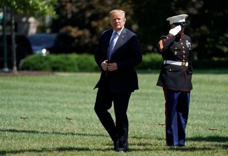 Tổng thống Mỹ Donald Trump trên sân Nhà Trắng ngày 18-7. Ảnh: REUTERS