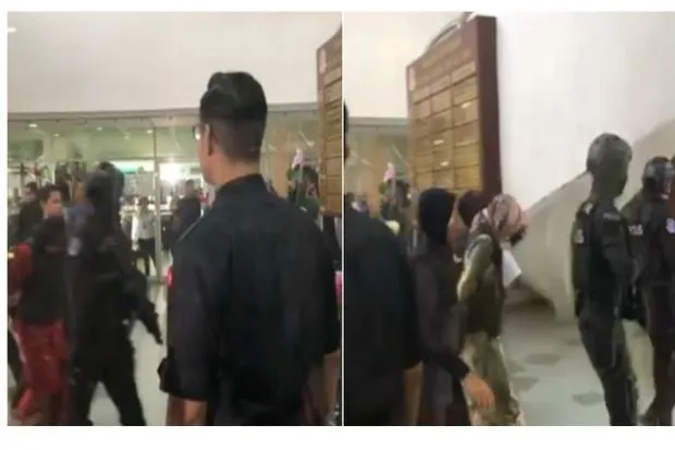 Hai bị cáo Siti Aisyah (trái) và Đoàn Thị Hương (phải) được hộ tống đến tòa sáng nay 16-8. Ảnh: THE STAR