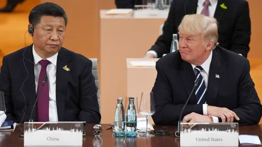 Chủ tịch Trung Quốc Tập Cận Bình (trái) và Tổng thống Mỹ Donald Trump tại hội nghị G20 ở Đức ngày 7-7-2017. Ảnh: AFP