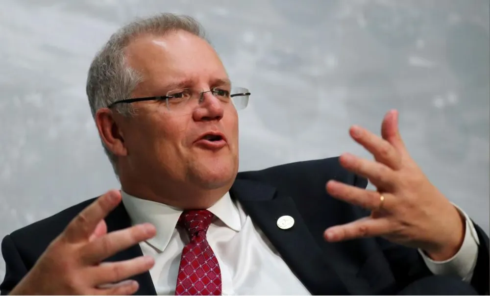 Bộ trưởng Tài chính Úc Scott Morrison cũng đang nhắm đến ghế thủ tướng của ông Malcolm Turnbull. Ảnh: REUTERS