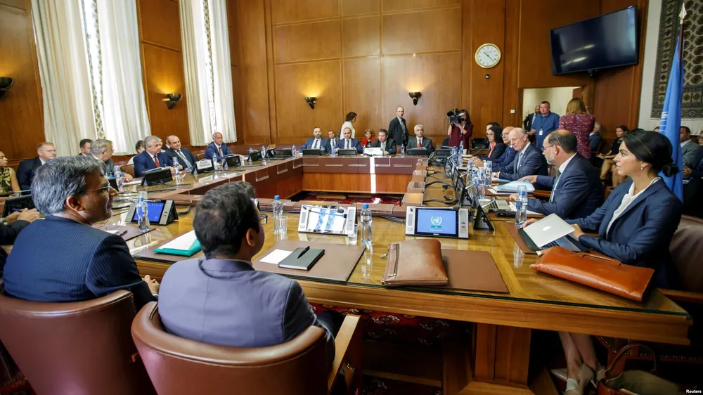 Quang cảnh cuộc gặp giữa đại diện Thổ Nhĩ Kỳ, Nga, Iran về Syria tại trụ sở LHQ ở Geneva (Thụy Sĩ) ngày 11-9. Ảnh: REUTERS