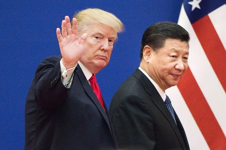 Tổng thống Mỹ Donald Trump (trái) và Chủ tịch Trung Quốc Tập Cận Bình (phải) thống nhất đình chiến thương mại 90 ngày để đàm phán giải quyết cuộc chiến. Ảnh: GETTY IMAGES
