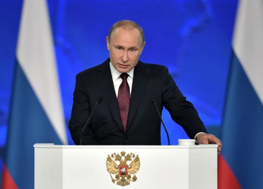 Tổng thống Nga Vladimir Putin phát biểu Thông điệp Liên bang trước các nghị sĩ, quan chức Hội đồng Liên bang, và nhiều quan chức cấp cao khác tại Quốc hội Nga ở Moscow (Nga) ngày 20-2. Ảnh: SPUTNIK