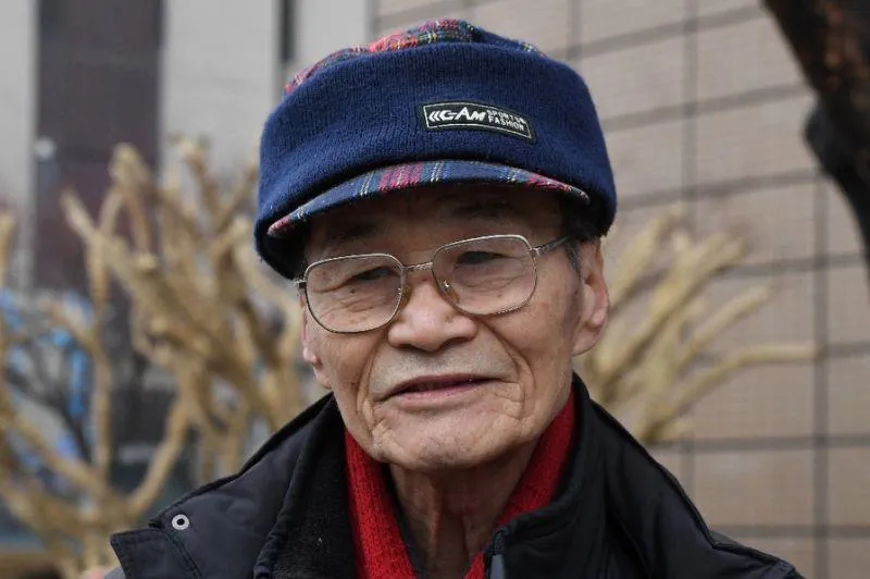 Ông cụ Choi Jae-kwan chỉ mới 12 tuổi khi chiến tranh Triều Tiên nổ ra năm 1950. Ảnh: AFP