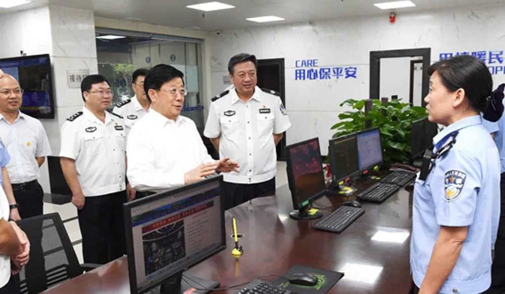 Bộ trưởng Bộ Công an Triệu Khắc Chí thăm văn phòng cảnh sát ở tỉnh Quảng Đông sát Hong Kong tháng trước. Ảnh: SCMP