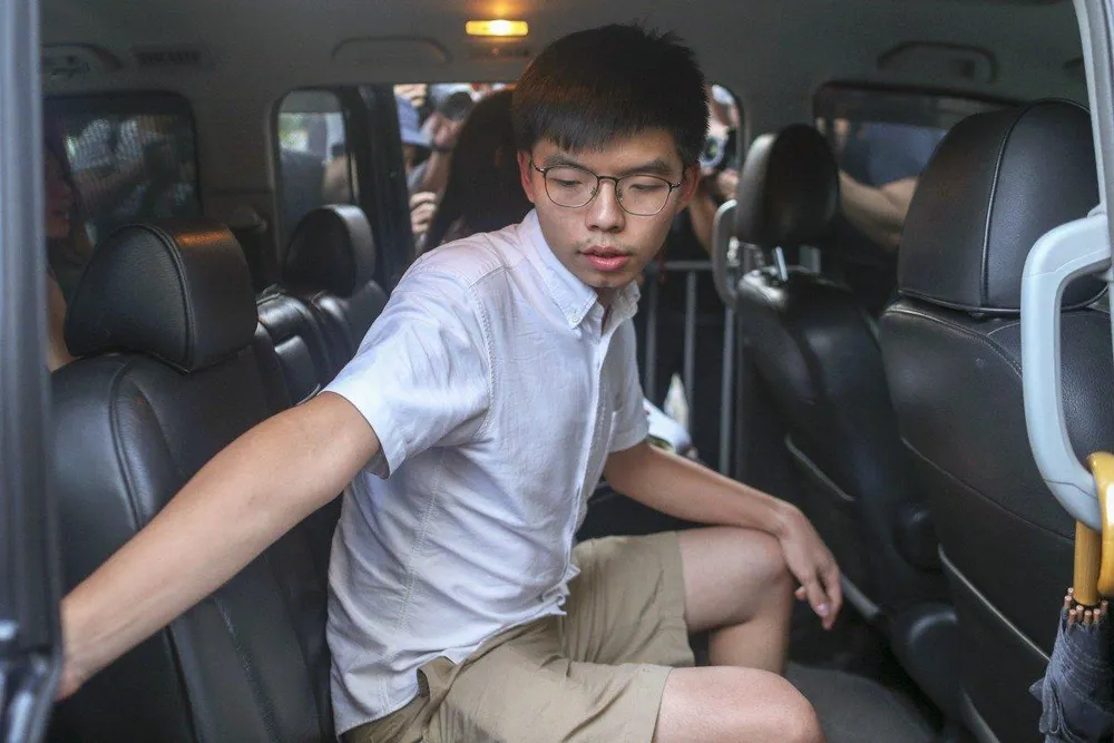 Hoàng Chi Phong được thả nhờ bảo lãnh ngày 30-8. Ảnh: EPA