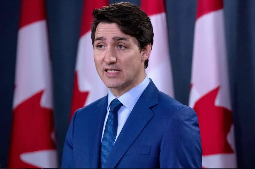 Thủ tướng Canada Justin Trudeau yêu cầu Mỹ không ký thỏa thuận thương mại với Trung Quốc chừng nào Trung Quốc chưa thả công dân của Canada. Ảnh: AFP