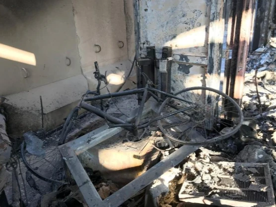 Hiện trường căn cứ không quân Ayn al-Asad ở tỉnh Anbar (Iraq) ngày 13-1, sau khi bị Iran nã tên lửa. Ảnh: REUTERS