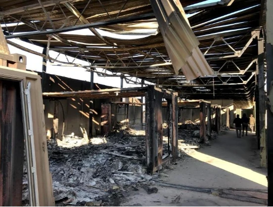 Hiện trường căn cứ không quân Ayn al-Asad ở tỉnh Anbar (Iraq) ngày 13-1, sau khi bị Iran nã tên lửa. Ảnh: REUTERS