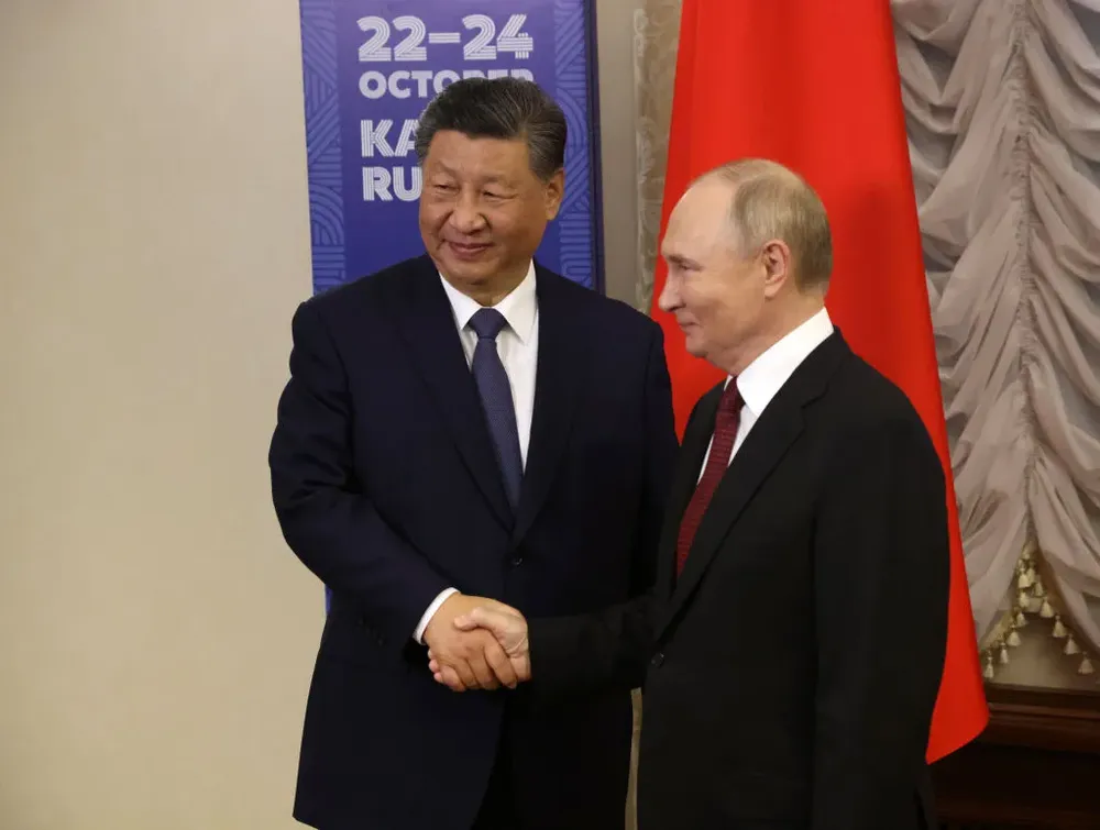 Thượng đỉnh BRICS-GettyImages-Putin tiếp ông Tập.jpg