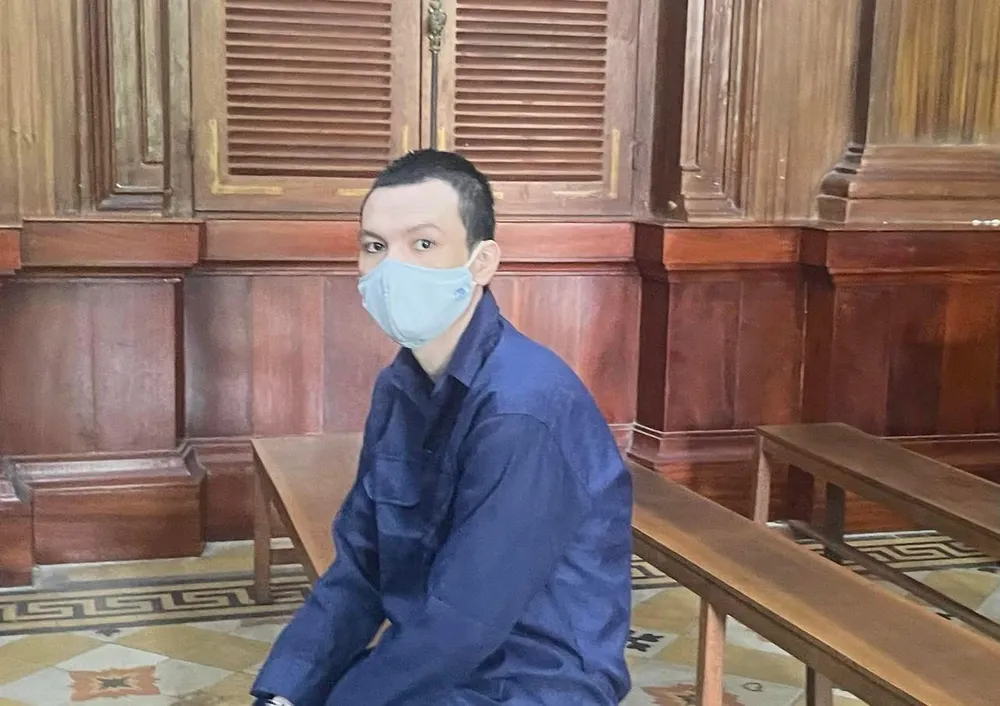 Bị cáo Lê Ngọc Việt sáng 12-7. Ảnh: HOÀNG YẾN