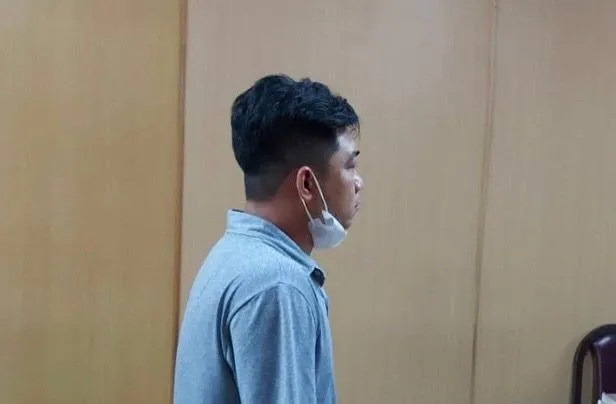 Nguyễn Văn Đạt tại phiên xử sáng 15-7. Ảnh: H.YẾN