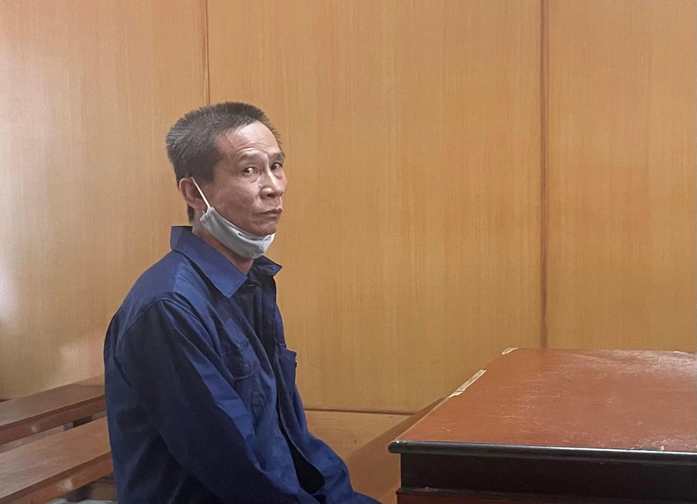 Bị cáo Ngũ Quốc tại phiên xử sáng 18-8. Ảnh: H.YẾN