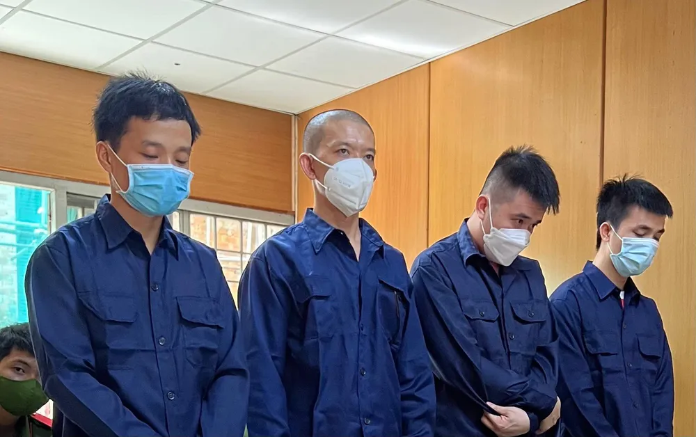 Bốn bị cáo tại toà. Ảnh: H.YẾN Bốn bị cáo tại toà. Ảnh: H.YẾN