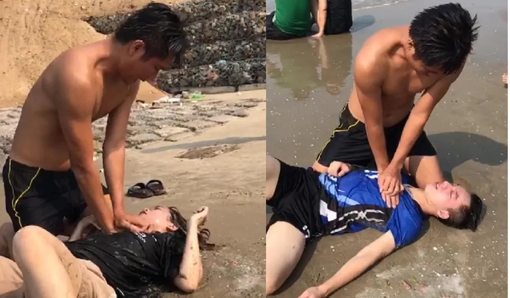 Trung úy Hiếu đang hô hấp nhân tạo cứu hai nạn nhân bị đuối nước sáng 10-4.