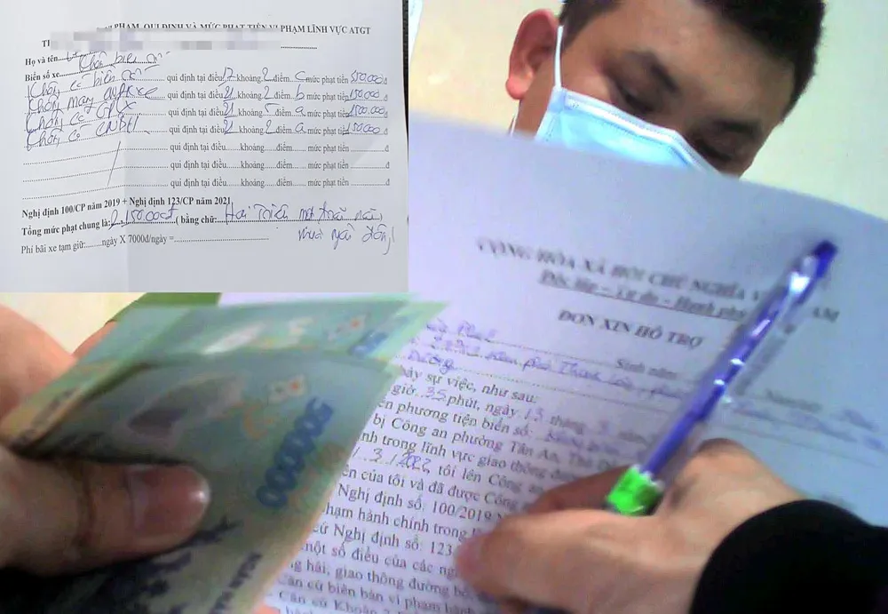 Anh Ph viết vào giấy “xin hỗ trợ” trước khi đưa tiền cho trung úy Đại. Ảnh: NT - NY Anh Ph viết vào giấy “xin hỗ trợ” trước khi đưa tiền cho trung úy Đại. Ảnh: NT - NY