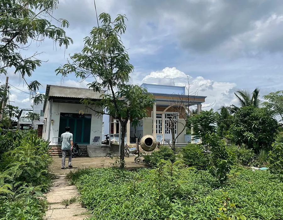 Sau khi UBND huyện Nhà Bè điều chỉnh lại quy hoạch Khu công nghiệp Hiệp Phước, người dân tại đâyđã được sửa chữa nhà của mình. Ảnh: VIỆT HOA