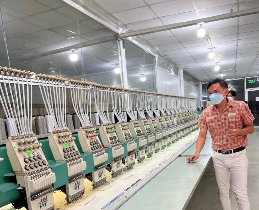 Ngành dệt may đang thích ứng nhanh với những biến động kinh tế thế giới. Ảnh: QH