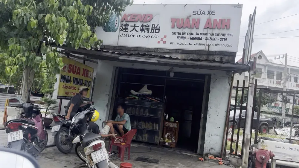 Tiệm sửa xe của Mai Văn Hòa. p45_PHU4_dieutra_phaxe_quoclo_ttam.jpg