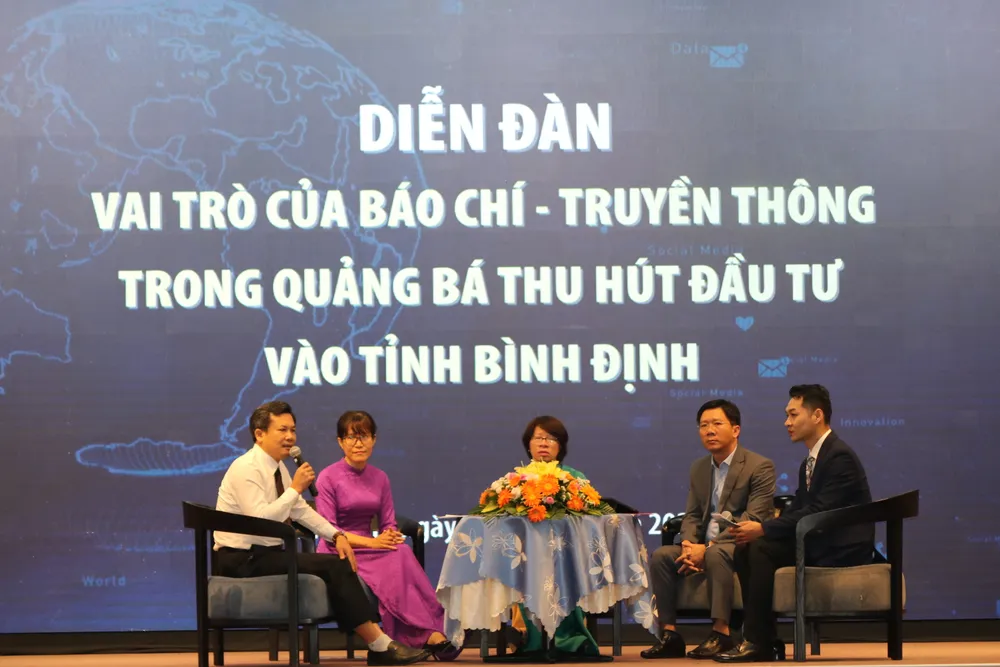 Diễn đàn nhằm nâng cao vai trò của báo chí - truyền thông trong việc quảng bá xúc tiến đầu tư vào tỉnh Bình Định. Ảnh: QN