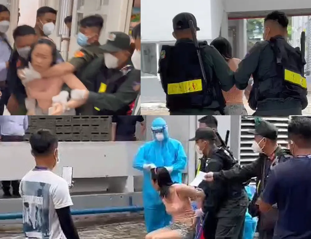 Bà HTPL bị lực lượng chức năng khống chế test COVID-19 vào năm 2021. Ảnh: Cắt từ clip Bà HTPL bị lực lượng chức năng khống chế test COVID-19 vào năm 2021. Ảnh: Cắt từ clip
