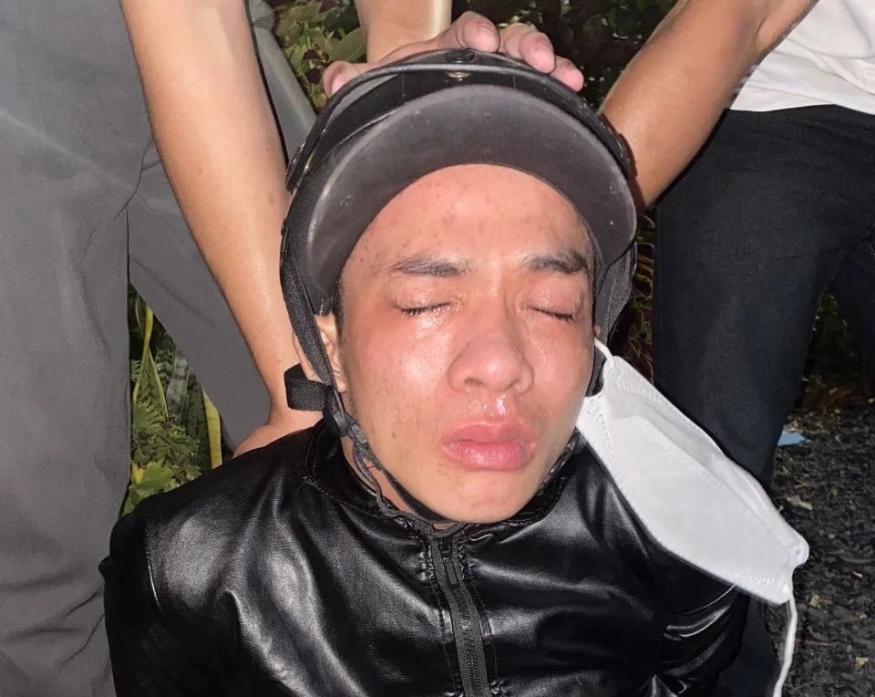 Nghi phạm bị công an bắt giữ. Ảnh: LA Nghi phạm bị công an bắt giữ. Ảnh: LA