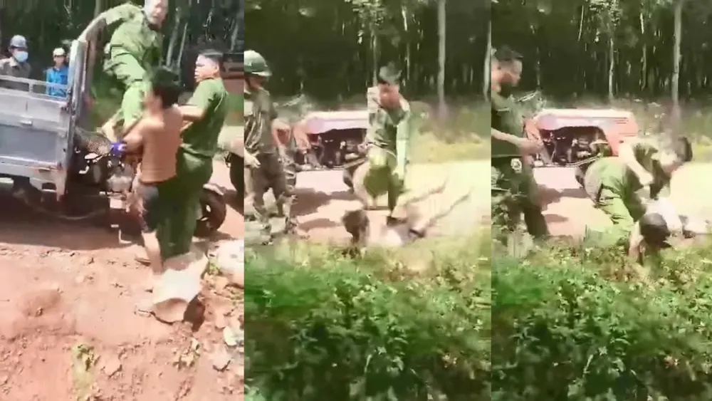 Hình ảnh người mặc sắc phục công an đấm đá túi bụi vào mặt một người dân. Ảnh: Cắt từ clip