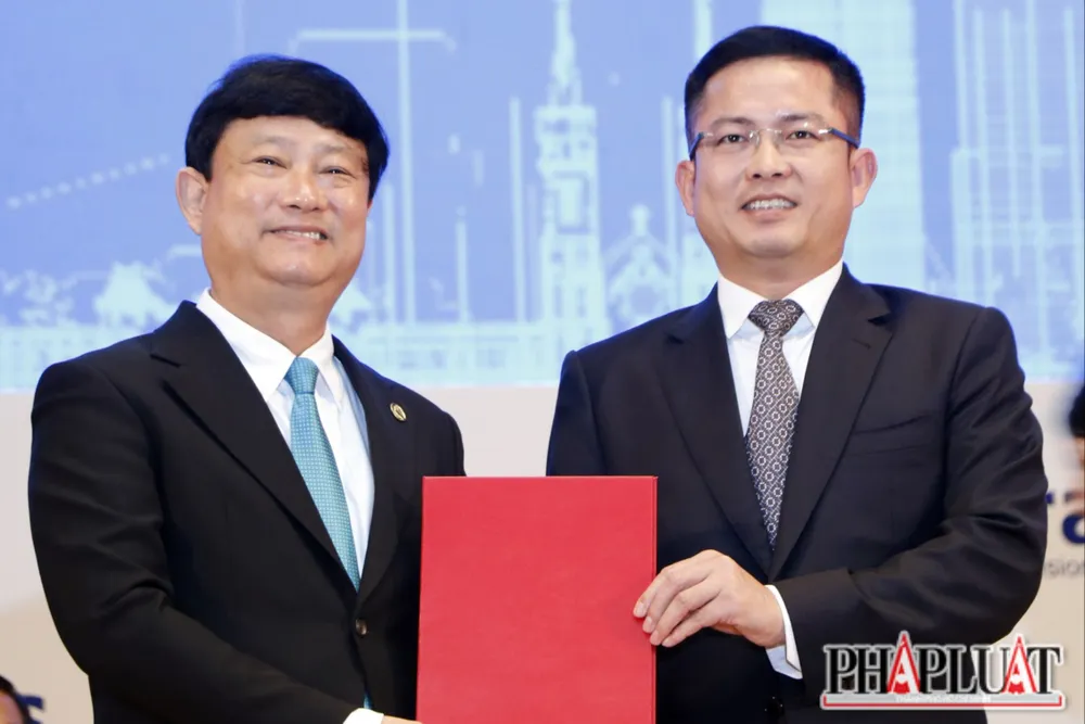 UBND tỉnh Bình Dương và Tổng Công ty Cổ phần Bưu chính Viettel trao biên bản thỏa thuận hợp tác. phó thủ tướng (6).JPG