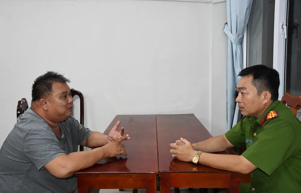 Công an lấy lời khai Nguyễn Văn Dự