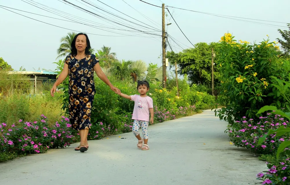 Ông trưởng khu phố vận động dân hiến đất làm đường ảnh 2