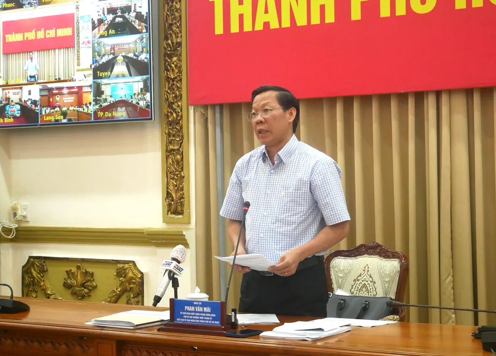 Chủ tịch UBND TP Phan Văn Mãi phát biểu tại hội nghị. Ảnh: T.DÂN Chủ tịch UBND TP Phan Văn Mãi phát biểu tại hội nghị. Ảnh: T.DÂN