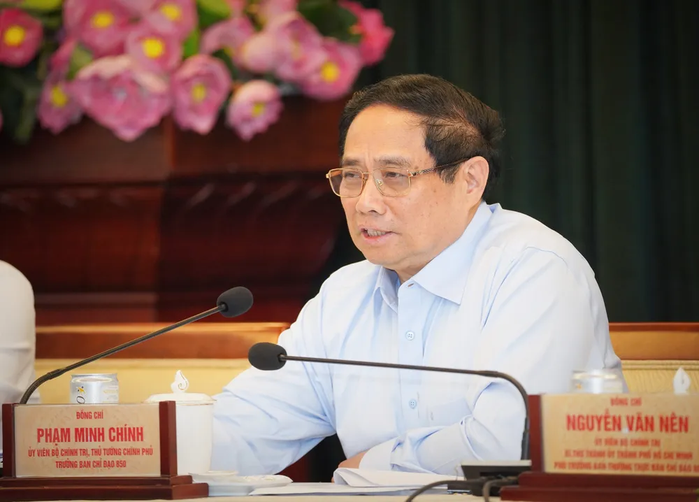 Thủ tướng Phạm Minh Chính khẳng định quyết tâm dùng một luật sửa nhiều luật. Ảnh: THUẬN VĂN chu-tich-tp.hcm-4.jpg