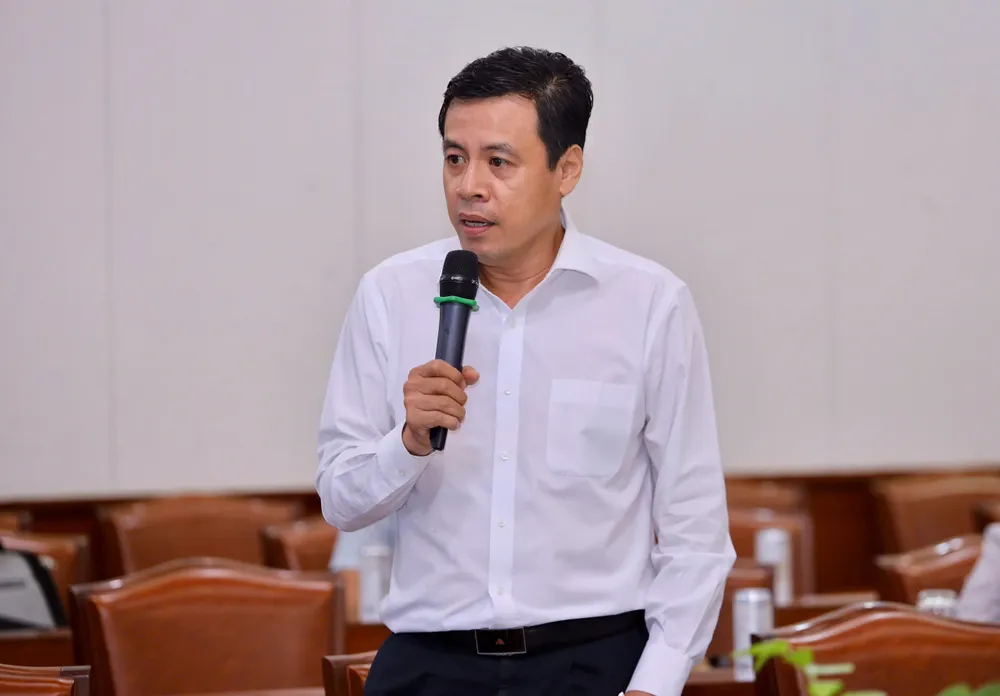 Ông Trần Anh Tuấn, Trưởng ban Ban đổi mới quản lý doanh nghiệp TP.HCM. Ảnh: NGUYỆT NHI nha-tren-kenh-rach-7.jpg