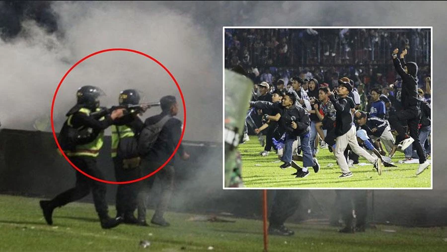 Thói quen xấu của người hâm mộ Indonesia, cách ứng xử của cảnh sát Indonesia bắn đạn hơi cay vào khán giả, vào đám đông là nguyên nhân chính dẫn đến giẫm đạp và số người chết vì bạo loạn tăng cao. Ảnh: AFP