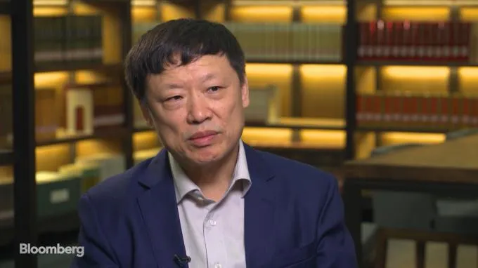 Ông Hồ Tích Tiến. Ảnh: BLOOMBERG Ông Hồ Tích Tiến. Ảnh: BLOOMBERG