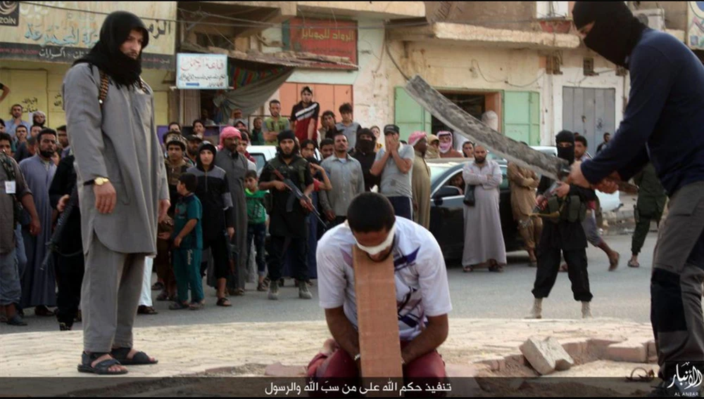 IS chặt đầu 10 phiến quân bỏ vị trí trên chiến trường ảnh 1