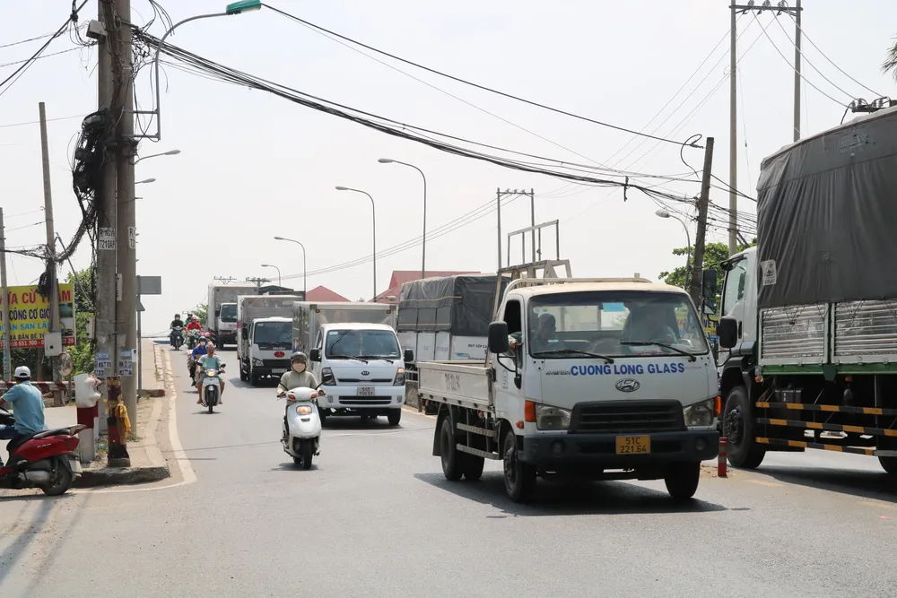 Đường Nguyễn Văn Bứa (từ Ngã Ba Giồng đến cầu Tỉnh lộ 9) được đề xuất mở rộng lên từ 32m - 40m. mo-rong-2.jpg