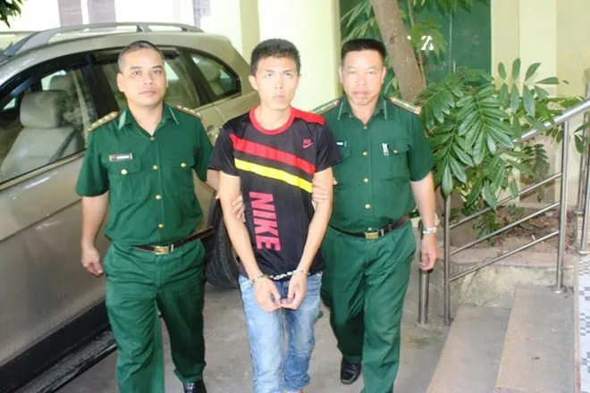 Tuấn khi bị bắt giữ.