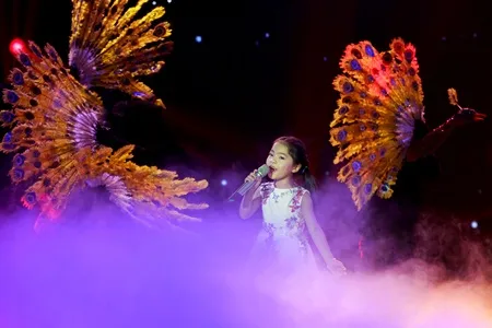 Thu An với tiết mục Lời mẹ hát.