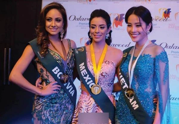 Nam Em chia sẻ, cô cảm thấy tự tin và thêm động lực để cố gắng trong các phần thi sau của Miss Earth. Ảnh NGÔI SAO