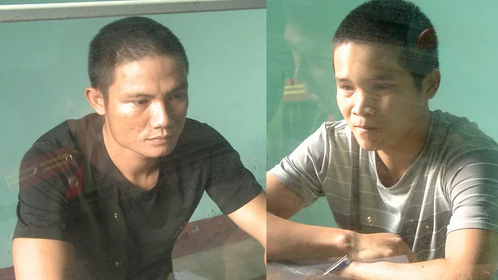 Nguyễn Trường Linh và Nguyễn Văn Nhật tại công an.