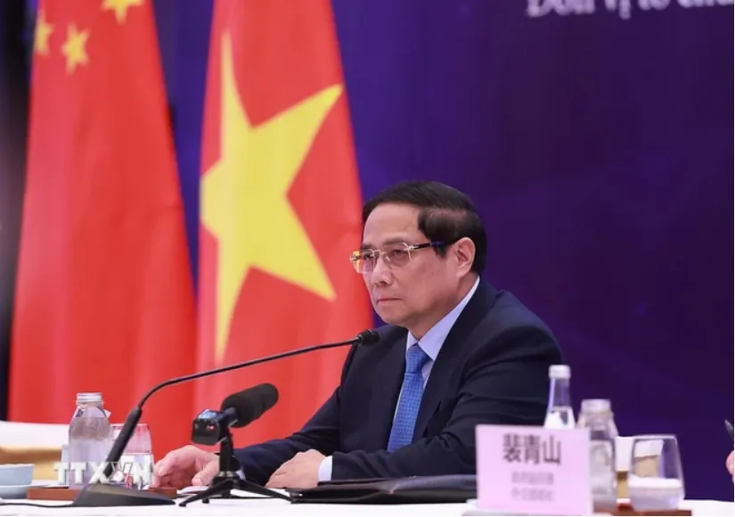 Thủ tướng Phạm Minh Chính phát biểu tại tọa đàm doanh nghiệp Việt Nam-Trung Quốc. (Ảnh: TTXVN) 1310TrungQuoc1.jpg