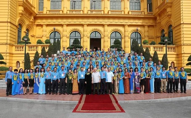 Tong Bi thu, Chu tich nuoc gap mat dai bieu can bo cong doan tieu bieu hinh anh 1